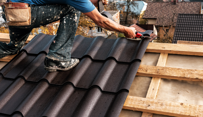Tile roofs being laid down