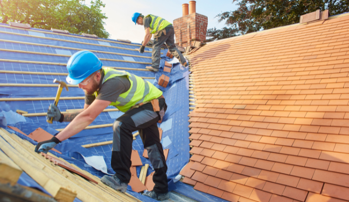 roof straps being installed